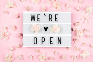 Lightbox,With,The,Text,We're,Open,On,A,Pink,Background